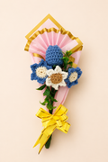 Bluebell Harmony Handcrafted Crochet Bouquet – blue hyacinth bud and daisy blooms with white narcissus in blush-pink wrap with yellow satin bow