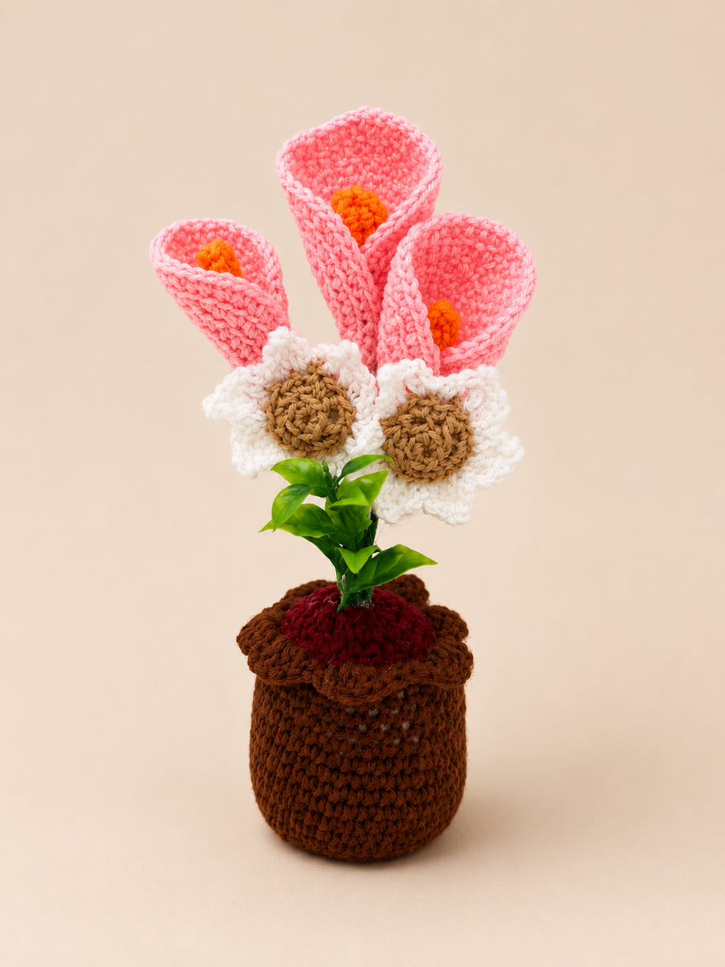 Blossom Harmony Handcrafted Crochet Flower Pot Keepsake with pink calla lily blooms, white daisies and a dark brown crochet pot