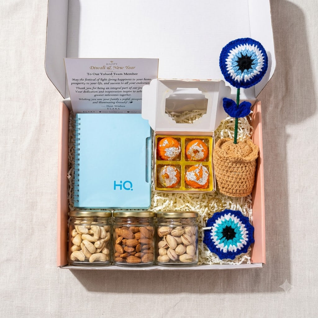 Diwali Gift Hamper Classic 2 arranged in a festive gift box with diary, mithai candles, evil eye keepsake, dry fruits, and greeting card
