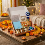 Diwali Gift Hamper Classic 2 presented in a festive Diwali setting with diary, scented mithai candles, evil eye accessories, dry fruits, and greeting card