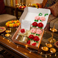 Diwali Gift Hamper Premium with Door Hangings presented in a festive box with rose jar candle, crochet flower door hangings, dry fruits, and greeting card
