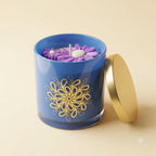 Lavender Bloom floral soy wax candle in blue glass jar with gold lid – clean product shot