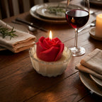 Premium scented red rose soy candle styled for an elegant evening setting