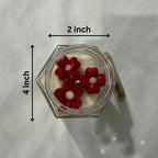 Scented red flower soy candle showing approximate dimensions of 4 inches high and 2 inches wide