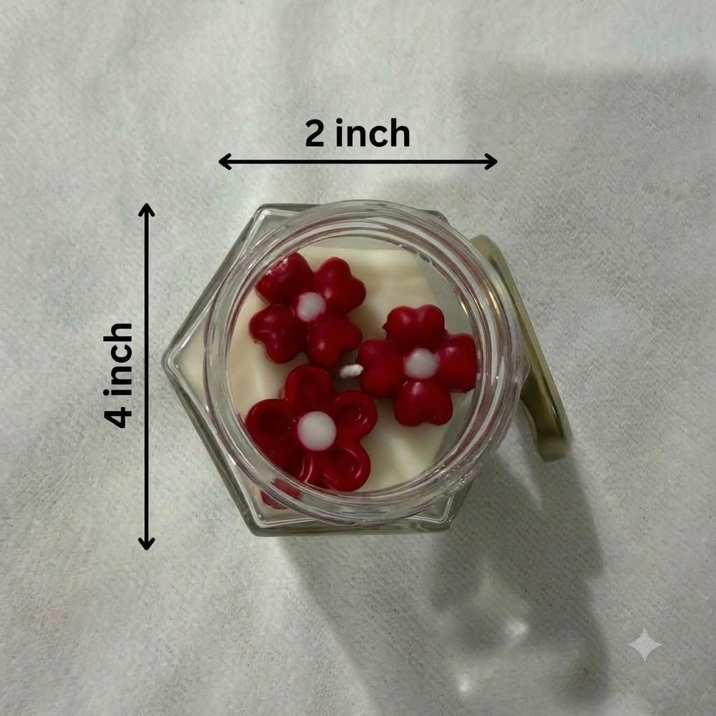 Scented red flower soy candle showing approximate dimensions of 4 inches high and 2 inches wide